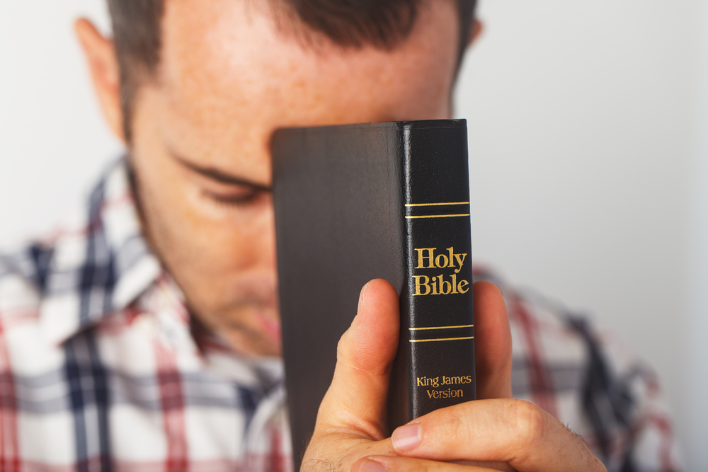 Christian Guy Holding an Holy Bible, Religion